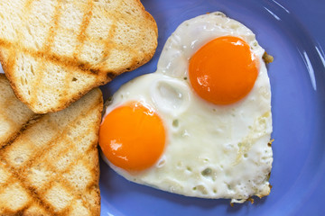 Heart shaped fried eggs