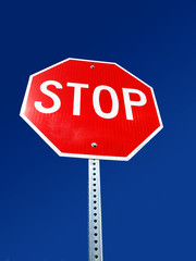 Stop Sign against blue sky