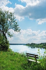 Wooden bench on the river