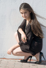 Beautiful Asian girl in broun dress