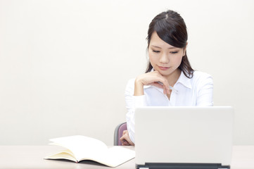 a portrait of young business woman working