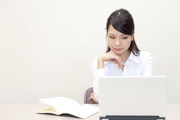 a portrait of young business woman working