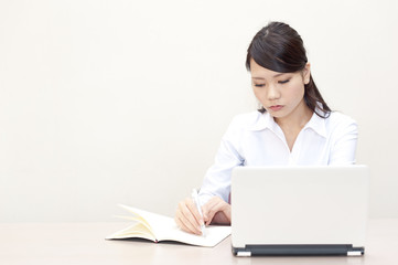 a portrait of young business woman working