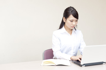 a portrait of young business woman working