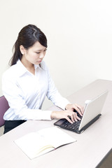 a portrait of young business woman working