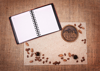 open notebook on background of sacking