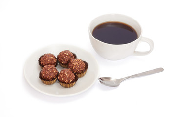 Cup of coffee and dessert. Isolated on white