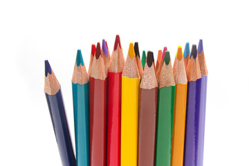 bunch of color pencils pointing up