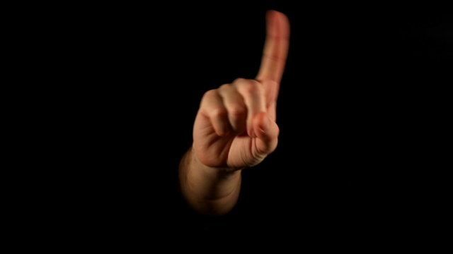 Forefinger shake gesture on black background