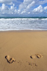 les pieds dans le sable