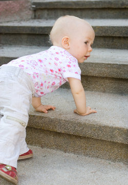 Fototapeta baby exploring stairs
