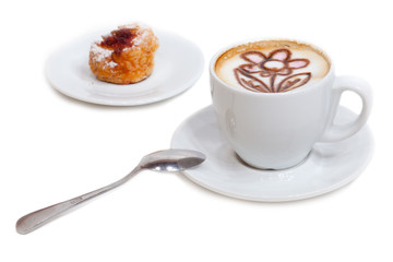 A cup of coffee with froth and painted flower
