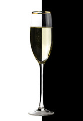 Glass of champagne over black and white background