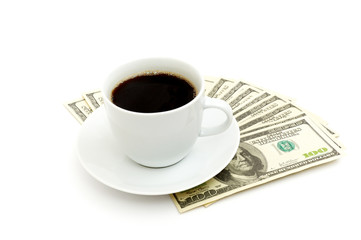 Coffee cup and dollar close up