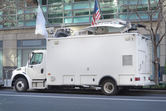 Television News Truck Van, Satellite Dish Roof, Parked on Street