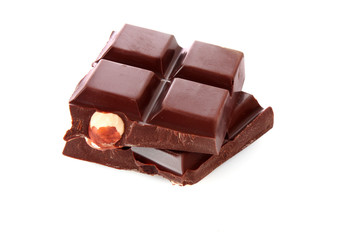 chocolate pieces on white background