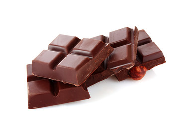 chocolate pieces on white background