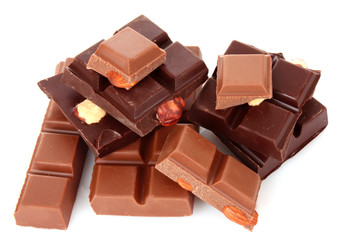 Many chocolate   pieces on white background
