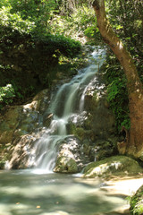 Naklejka na ściany i meble Tranquil waterfall Turkey