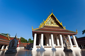 Front temple roof against blue sky