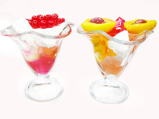 two desserts with pudding and jelly fruits