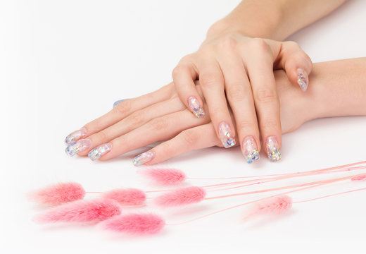 Sparkle gel nails and pink decoration spikes