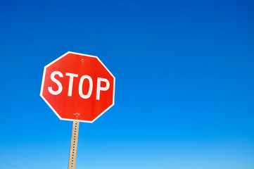Stop signal in the blue sky