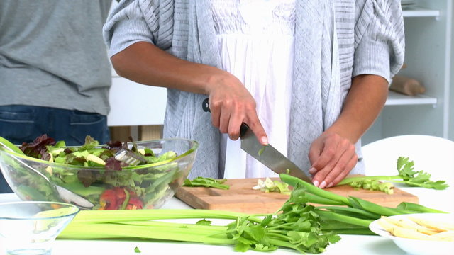 Woman cooking vegetables