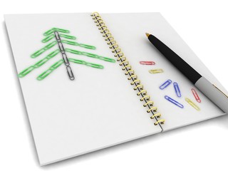 Notebook and pen on a white background