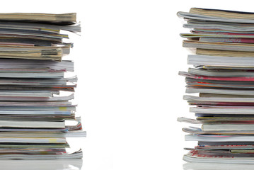 stack of magazines over white background