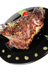 ribs on black plate