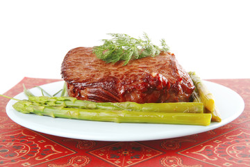 big beef block on blue dish
