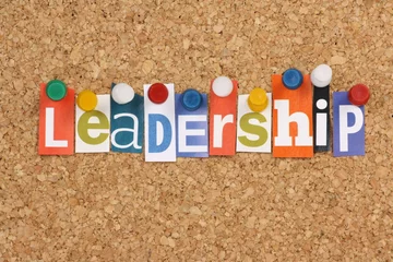 Foto op Plexiglas The word Leadership in magazine letters on a notice board © thinglass
