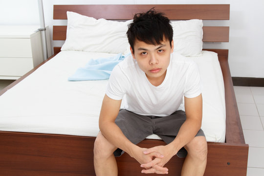 A Young Asian Man With Insomnia