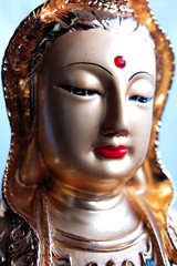 Closeup view of a golden buddha statue
