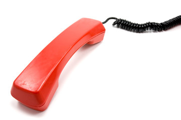 red old scratched telephone receiver on white background