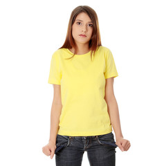 Obraz premium Young woman shows her empty pockets