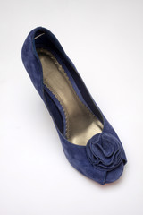 Blue high heeled shoe