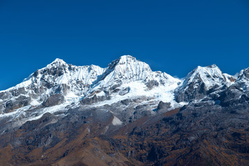 Fototapeta na wymiar High mountains, covered by snow.
