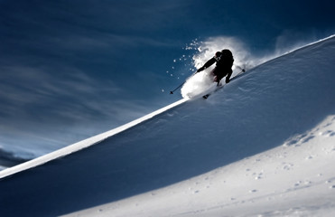 man skiing in deep powder snow - 28888480