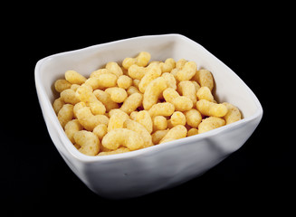 corn flips in a white bowl
