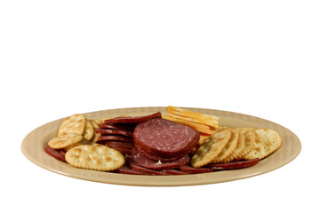crackers, cheese and sausage platter isolated