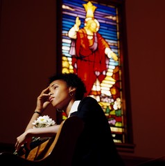 Woman Thinking In A Church