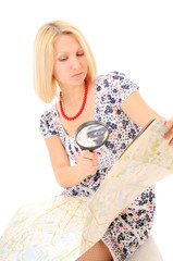 Attractive young blonde studying map