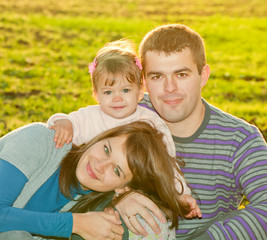 Fototapeta premium Photo of a happy family enjoying a autumn day