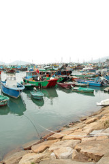 Fototapeta na wymiar Fishing and house boats anchored in Cheung Chau
