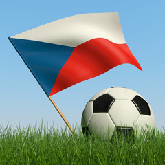 Soccer ball in the grass and flag of Czech Republic.