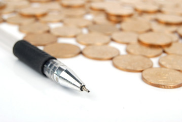 Coins and pen