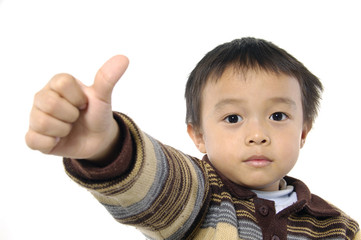 A photo of a boy with thumb up!