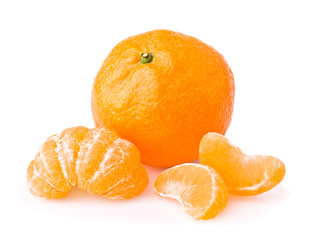 Ripe tangerine with slices isolated on white background